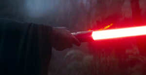 Hand holding a Red Bladed Lightsaber